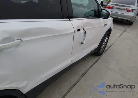 2016 Ford Escape Titanium z USA, uszkodzony, nr VIN 1FMCU0J97GUC78195